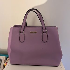 Kate spade purse color light purple , very good conditions